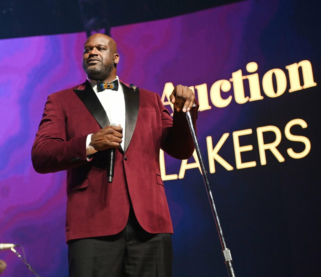 Dr. Shaquille O'Neal, Ed.D. speaking on stage