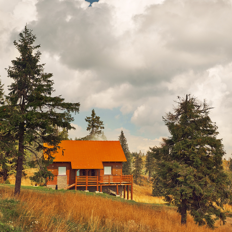 Residential log home maintenance by Pencil Log Pros in Colorado and Utah, including staining, sealing, refinishing, wood rot repair, and long-term log cabin care.